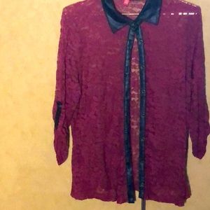 Lace see-through blouse with leather detail..